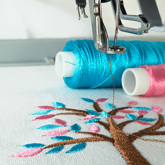 embroidered tree produced by an embroidery machine