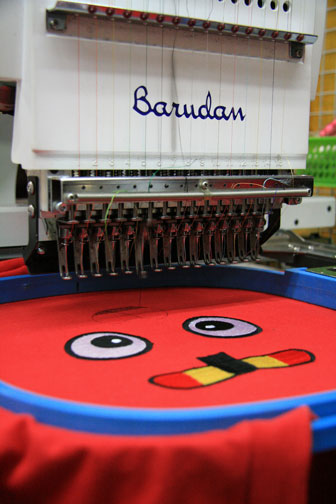 automated t-shirt embroidery via an embroidery machine